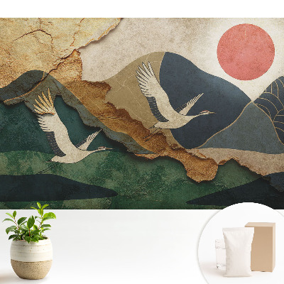 Fototapeta na wymiar do sypialni z motywem żurawi i czerwonego słońca przedstawiającym malowniczy krajobraz