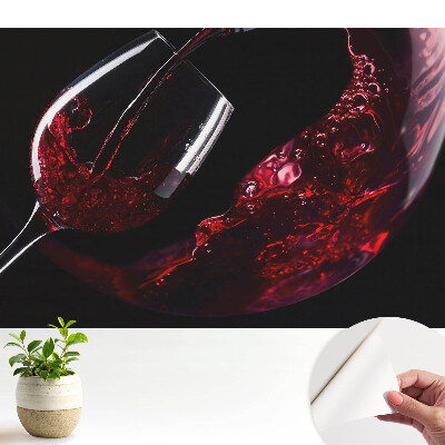 Fototapeta z nadrukiem samoprzylepna Kieliszek z wirującym winem