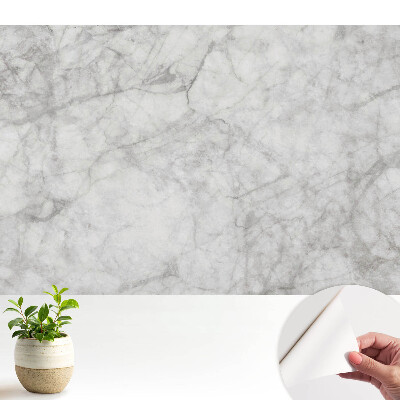 Fototapeta z nadrukiem samoprzylepna Marmurowy wzór subtelne żyłki jasne tło