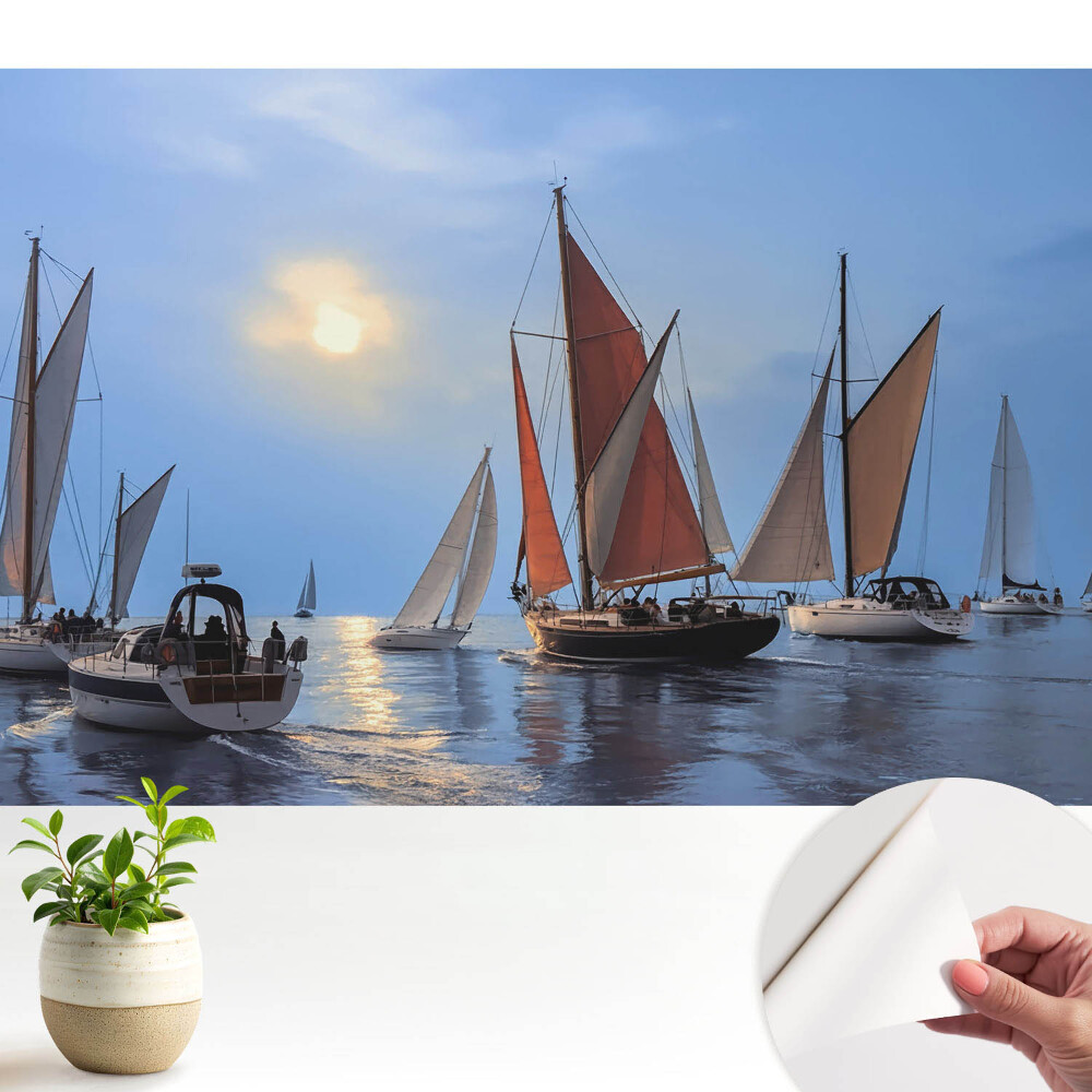 Fototapeta samoprzylepna do salonu Jachty i zachód słońca na spokojnym morzu