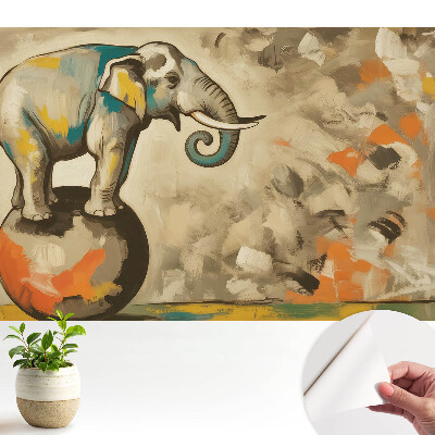 Fototapeta z nadrukiem samoprzylepna Kolorowy słoń na kuli