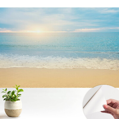 Fototapeta samoprzylepna do salonu Słoneczny poranek plaża morze harmonia