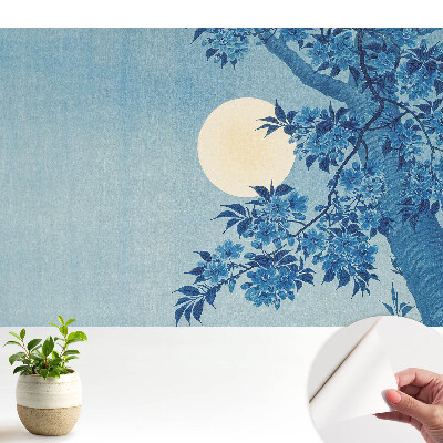 Tapeta fotograficzna samoprzylepna Niebieskie kwiaty przy księżycu