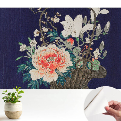 Fototapeta na wymiar do sypialni Klasyczna kompozycja kwiatów w wiklinowym koszu