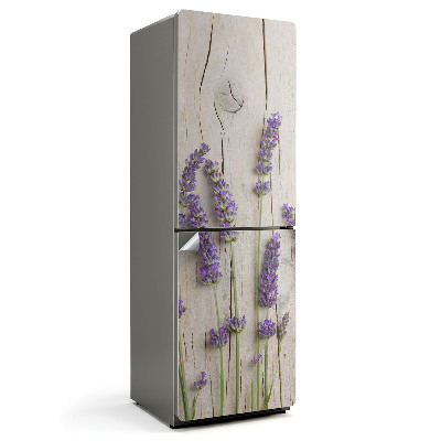 Naklejka tapeta na lodówkę Kwiaty lawendy na tle drewna