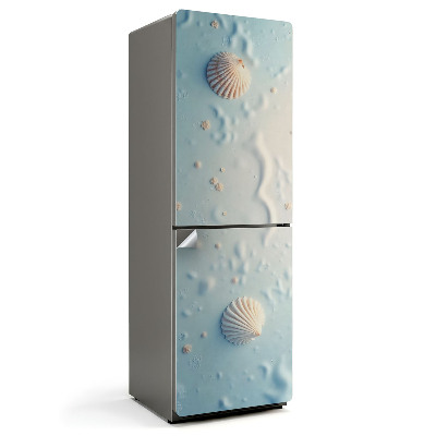 Naklejka na lodówkę Muszle na tle piasku