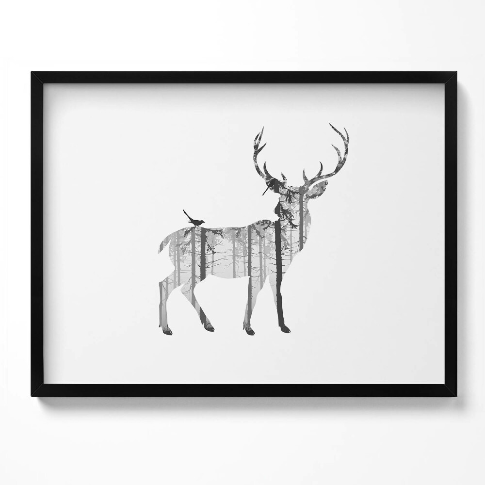 Obraz z ramką Sylwetka jelenia i las