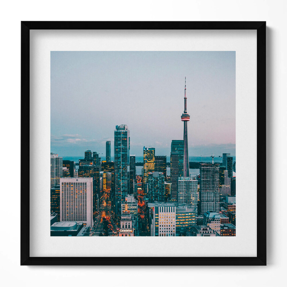 Obraz w drewnianej ramce Panorama miasta wieczorem