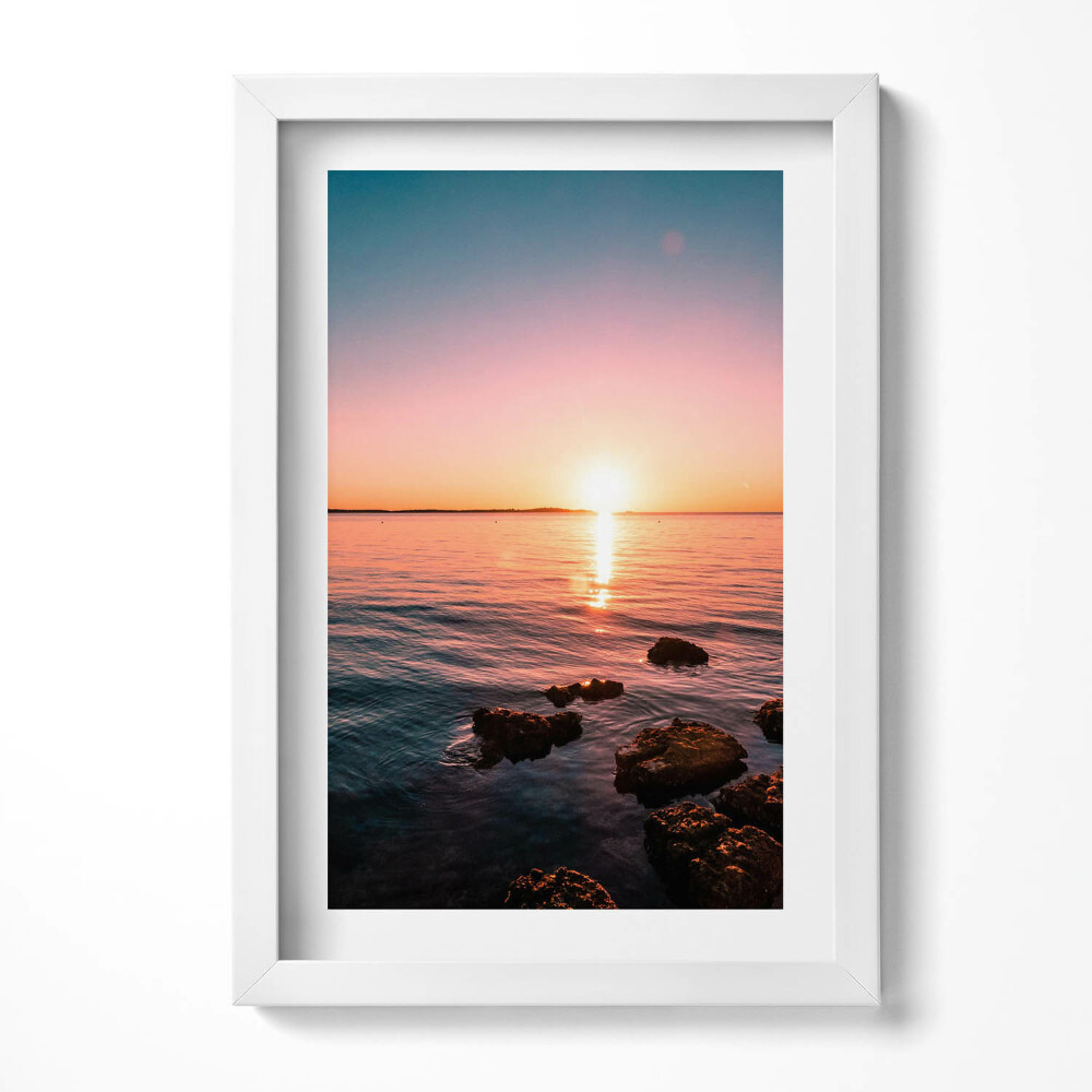 Obraz w ramie Skały o zachodzie słońca