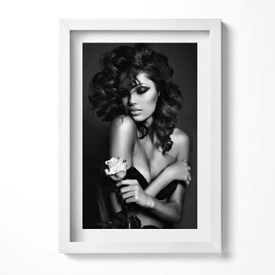 Obraz w ramie Portret pięknej kobiety z kwiatem