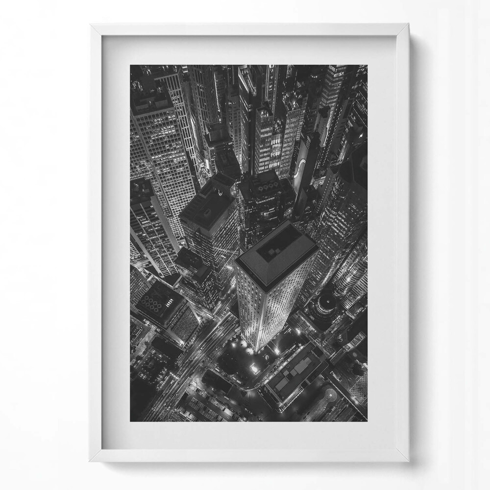 Obraz pionowy Wielkie miasto nocą z lotu ptaka