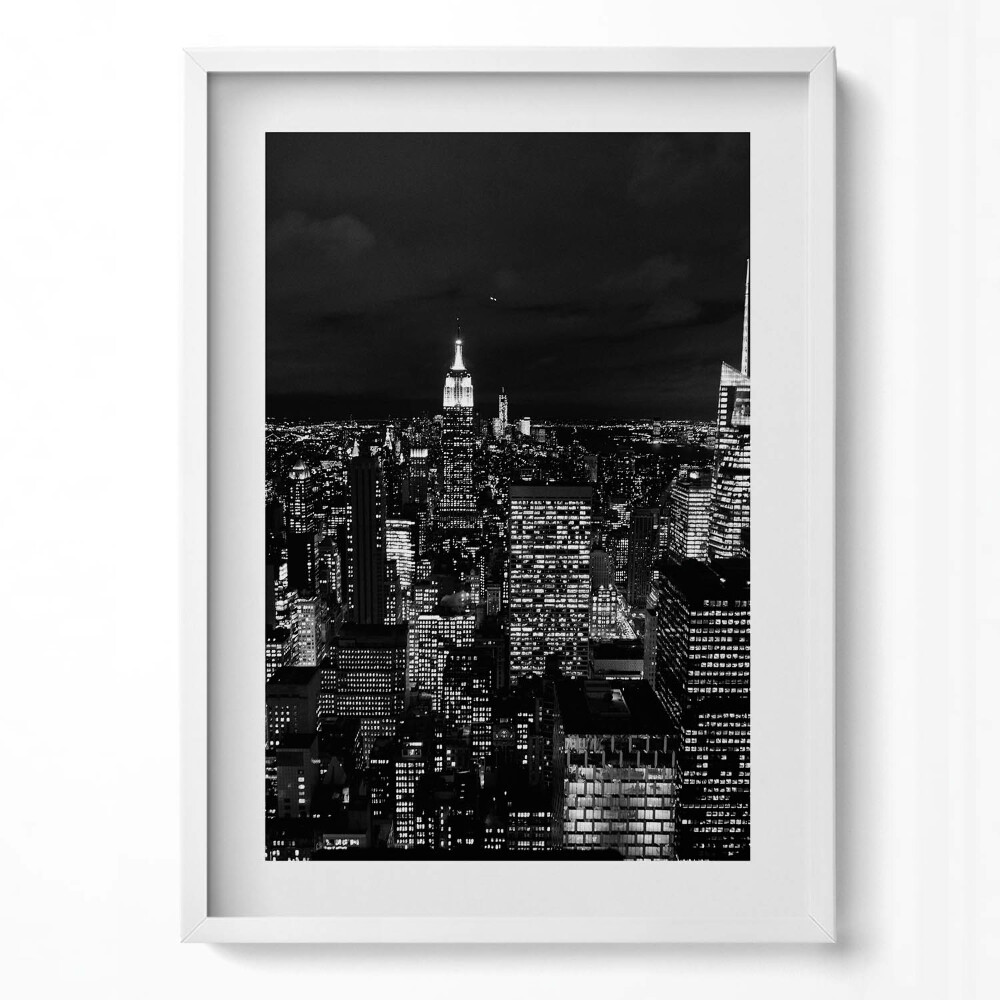 Obraz pionowy Czarno-biały pejzaż miasta nocą