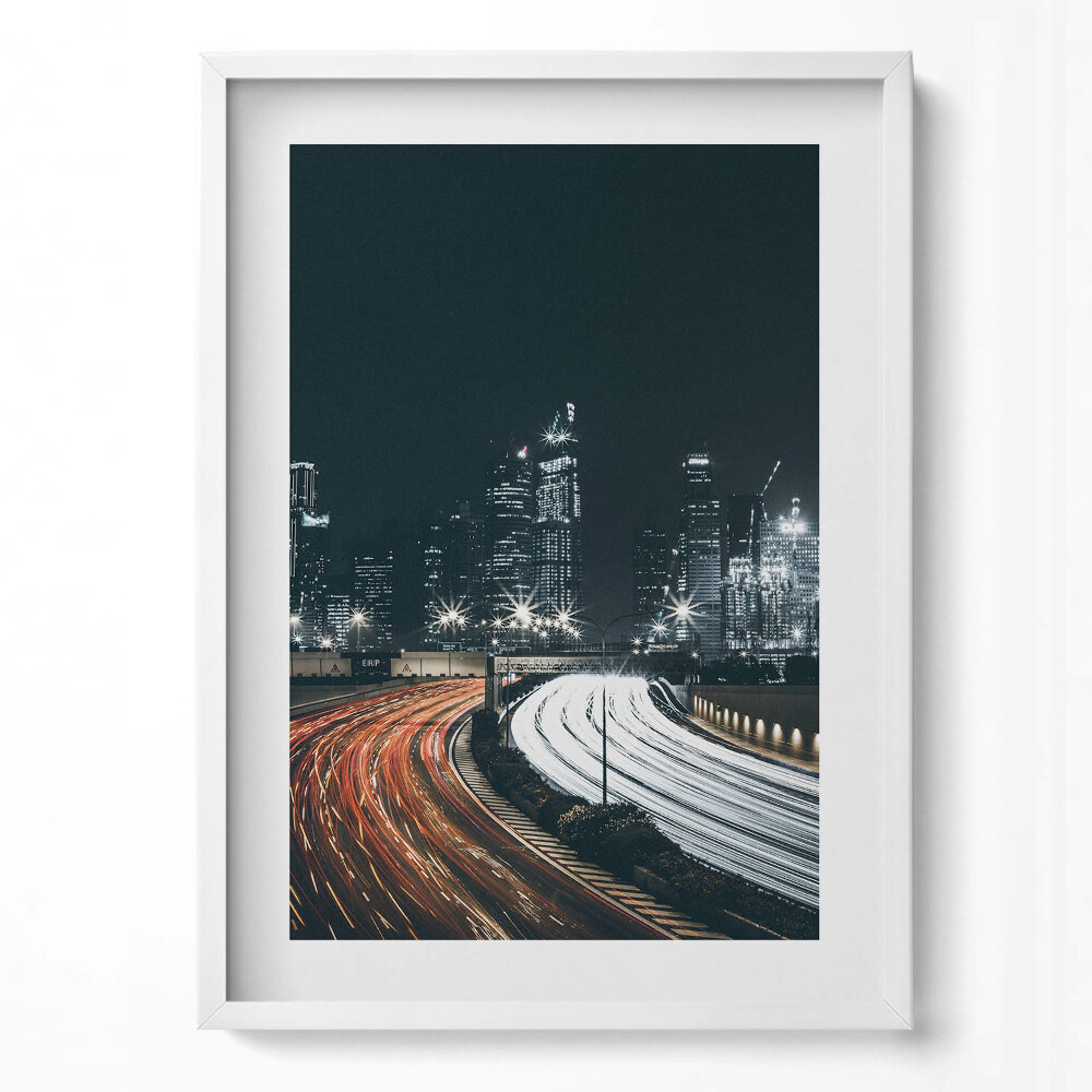 Obraz pionowy Ruchliwe ulice miasta nocą