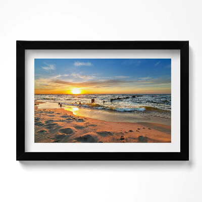 Obraz w ramie Wschód słońca nad morzem