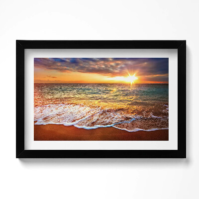 Obraz w ramie Fale morza o zachodzie słońca