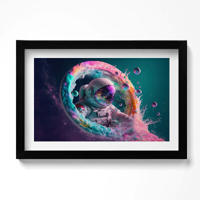 Obraz w ramie Kosmonauta kolorowe obłoki