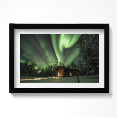 Obraz w ramie Zorza polarna i domek w lesie