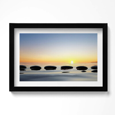Obraz w ramie Kamienie na wodzie o wschodzie słońca - zen