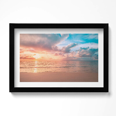 Obraz w ramie Romantyczny zachó słońca nad morzem