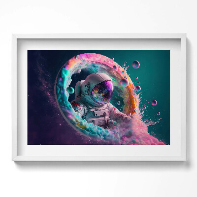 Obraz w ramie Kosmonauta kolorowe obłoki