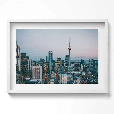Obraz w ramie Panorama miasta wieczorem