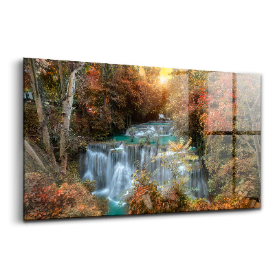 Obraz szklany Zachód słońca nad wodospadem